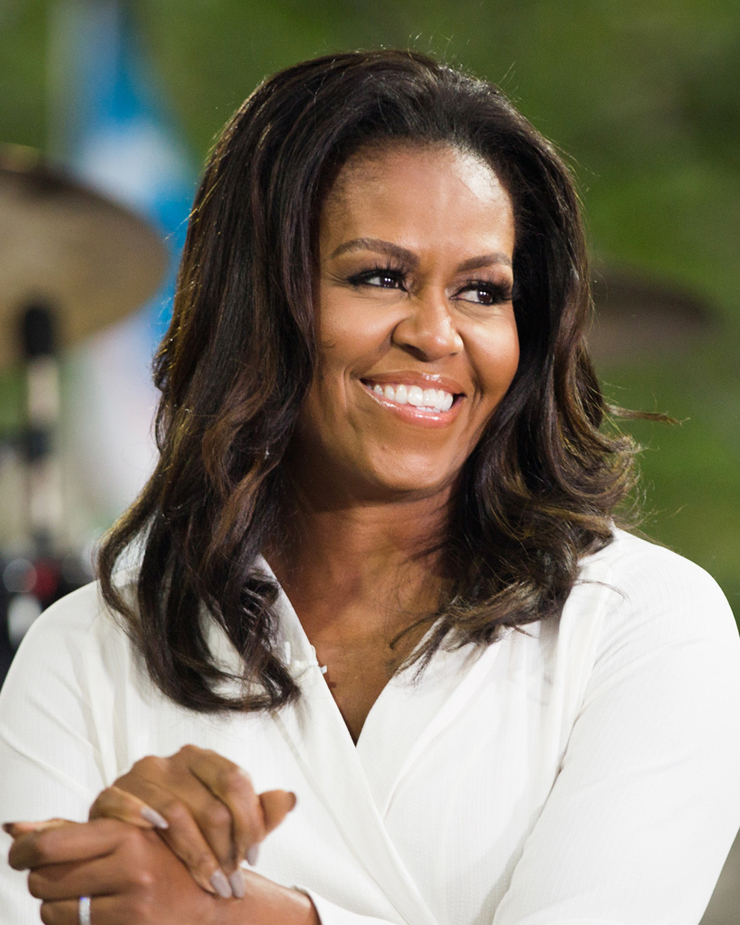 michelle obama stuns with curly hair and shares why she's